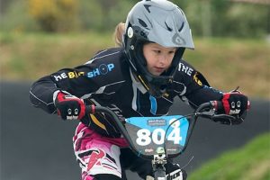 Chisnallwood Intermediate School's Lily Hovell negotiates the Tauranga BMX track during the 2016 NZCT AIMS Games. Photo: AIMS Games